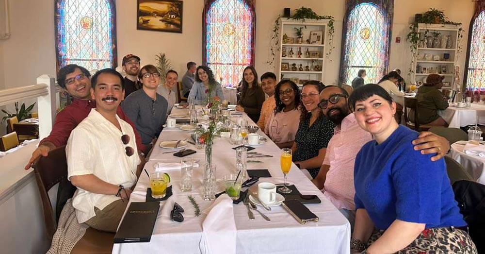 fellows celebrating at a restaurant