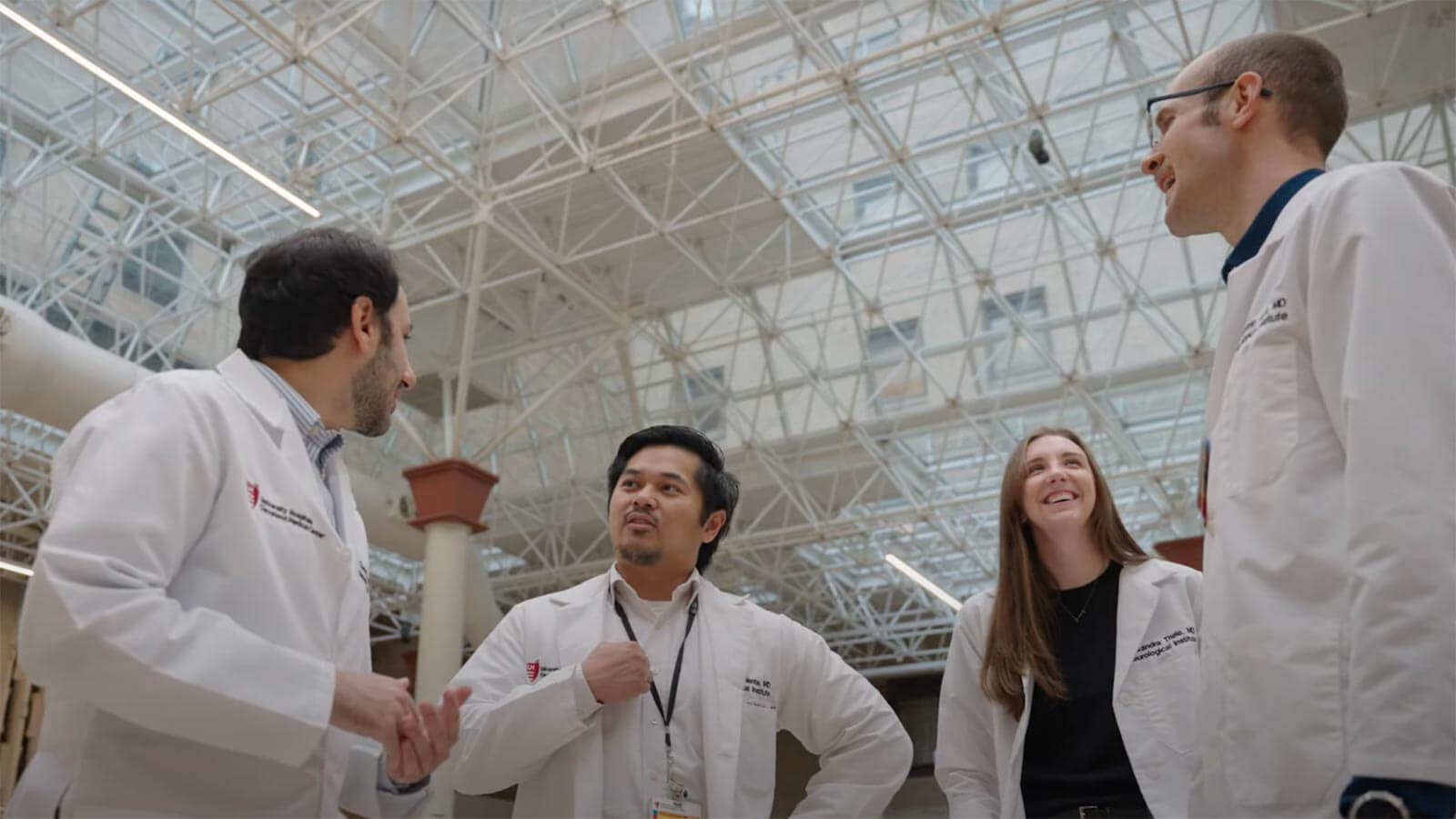 group of residents laughing and having a conversation