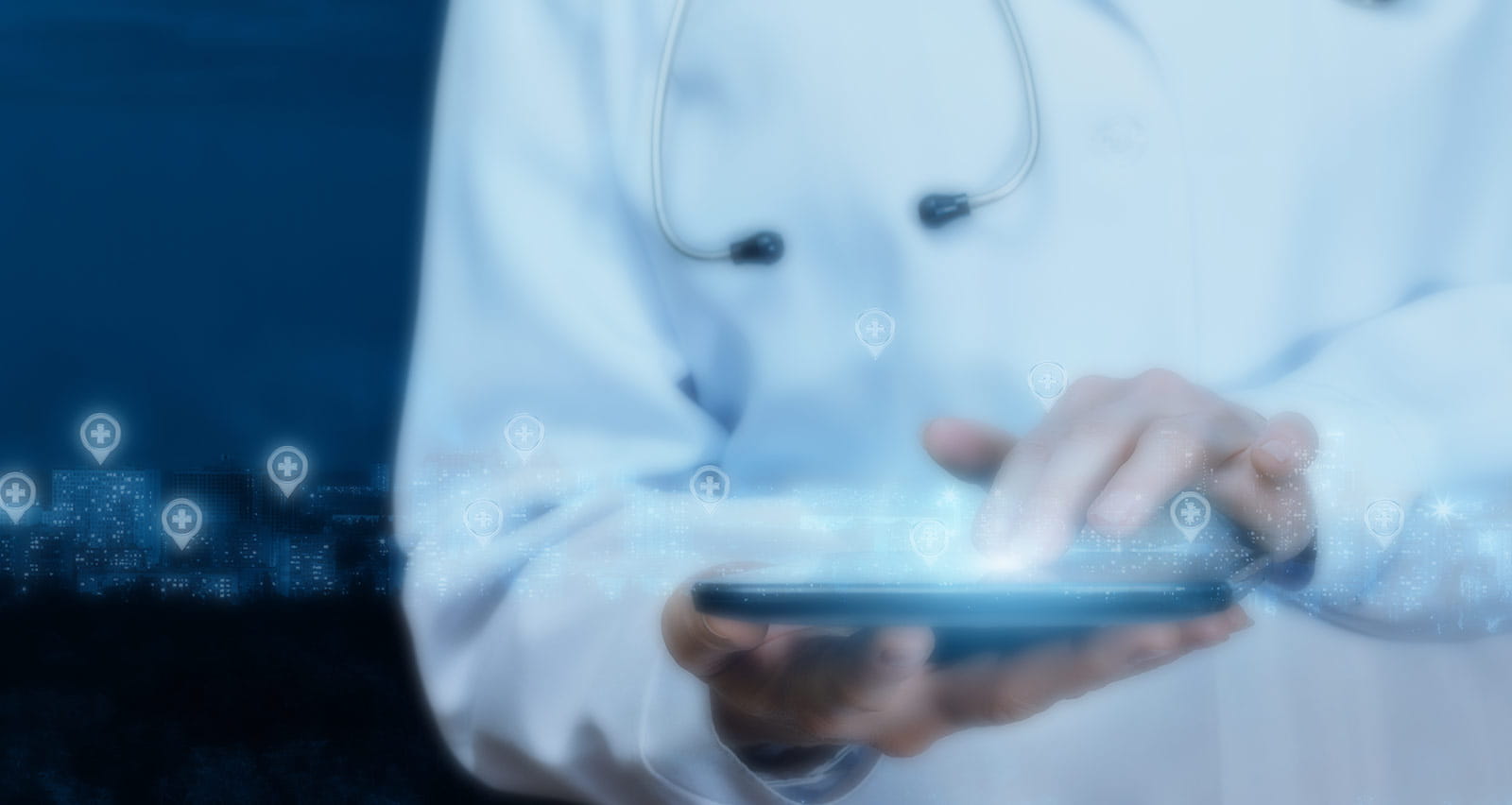 A doctor launches apps on a tablet