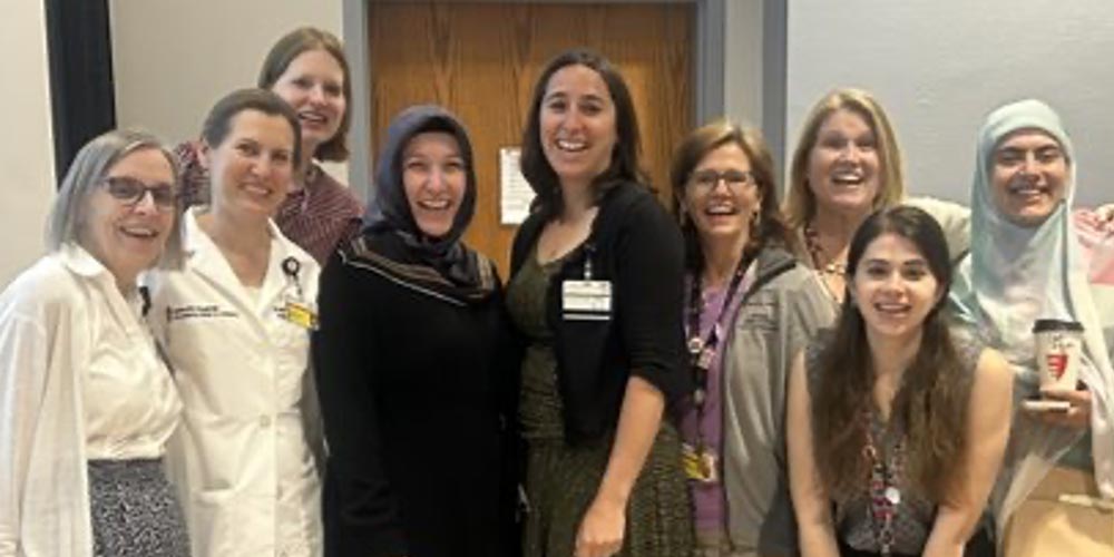fellows and faculty posing in a group