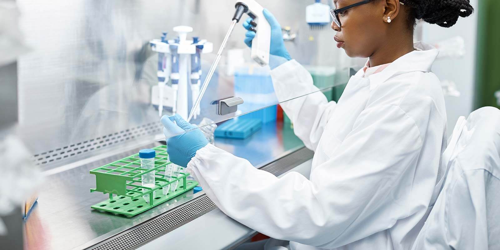 Scientist analyzing medical sample in laboratory