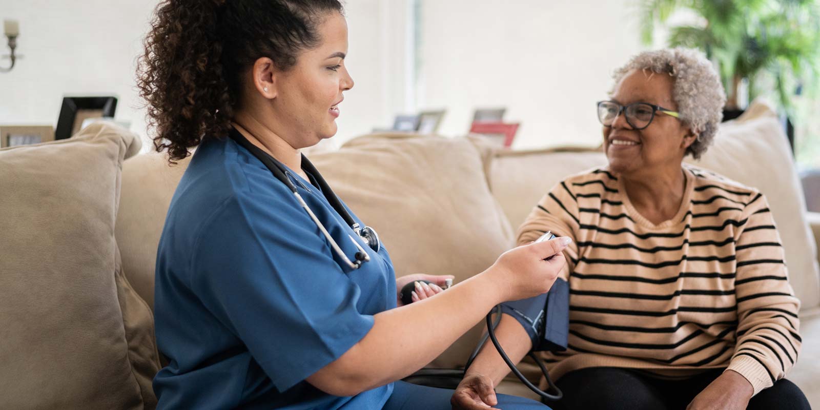 woman getting blood pressure taken