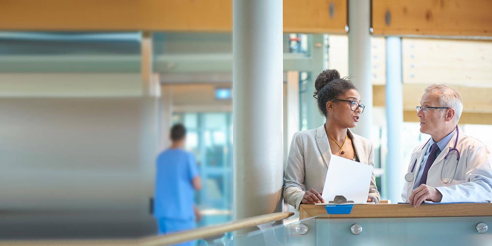 physician talking with a sponsor