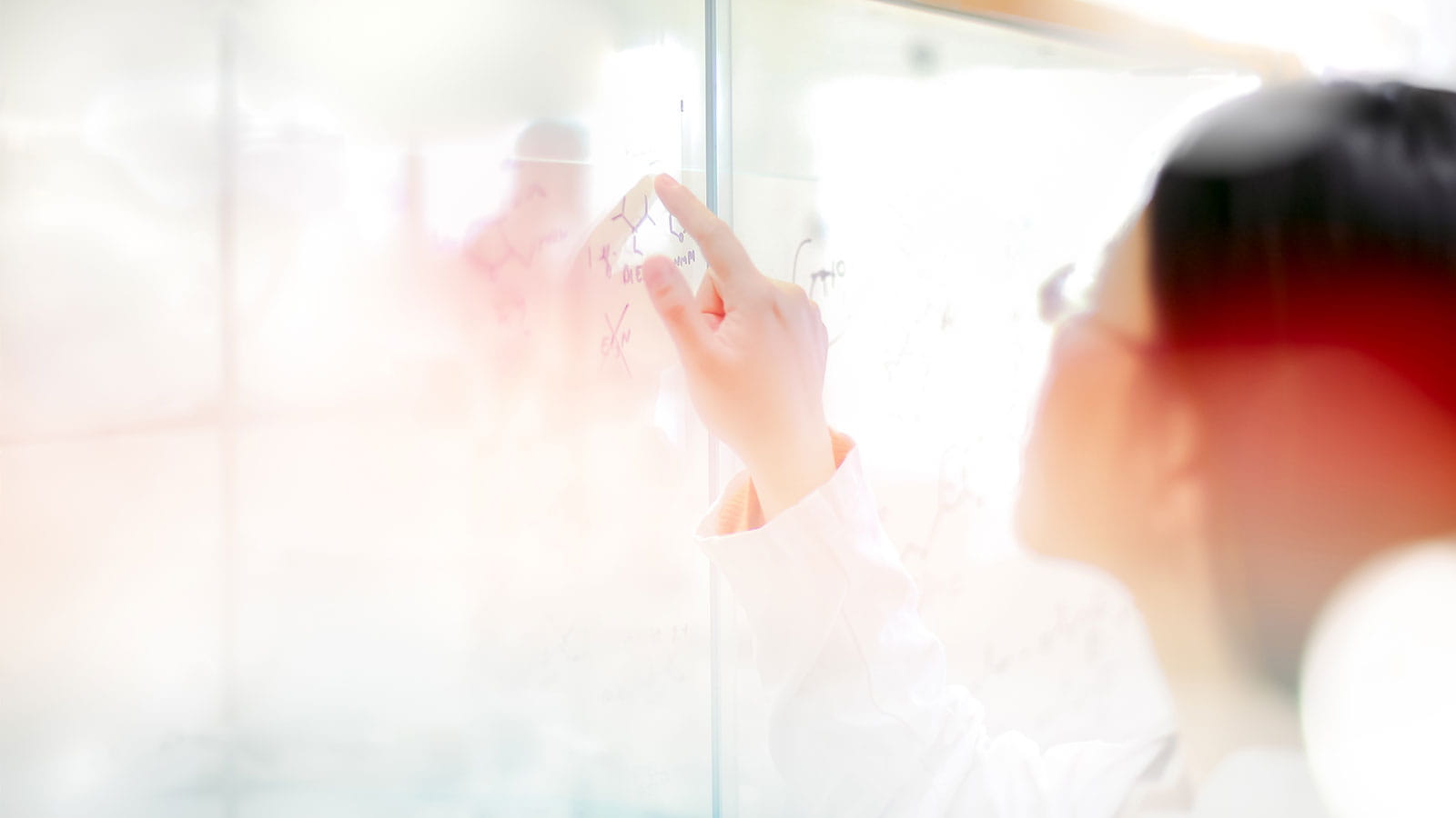 research and education physician at whiteboard