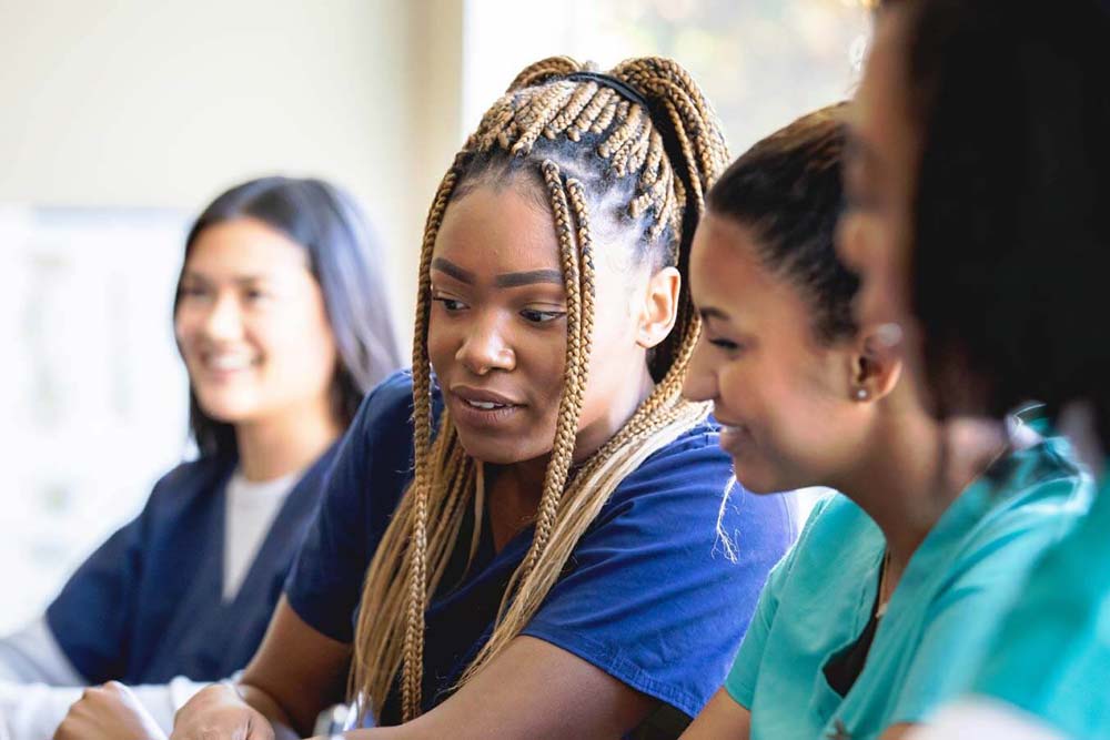group of students listening to lecture