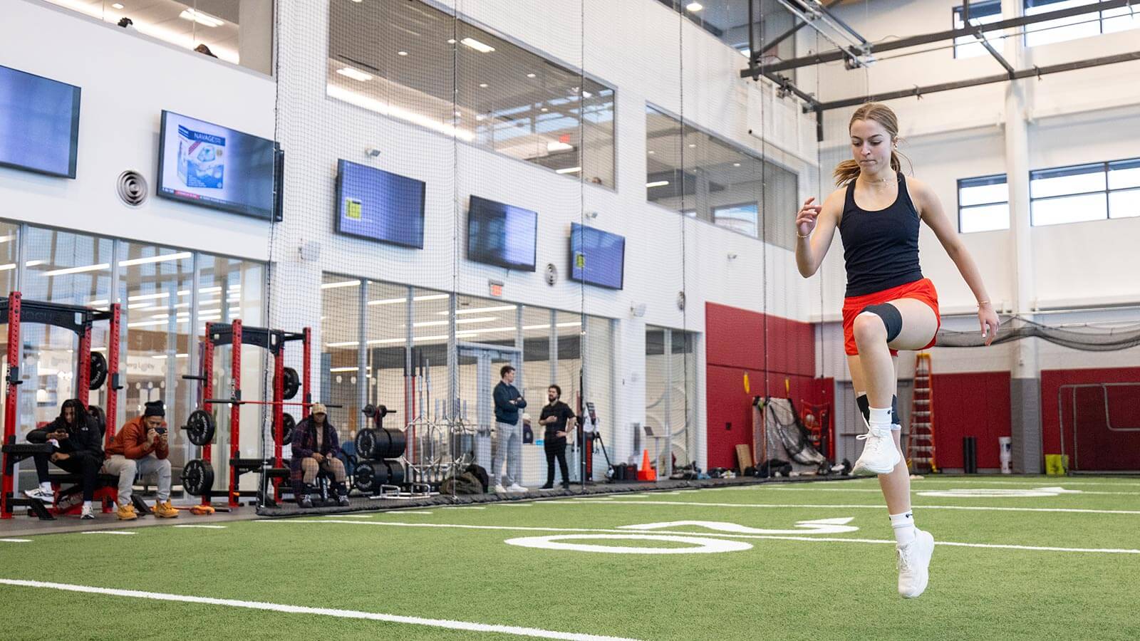woman athlete testing wearable technology