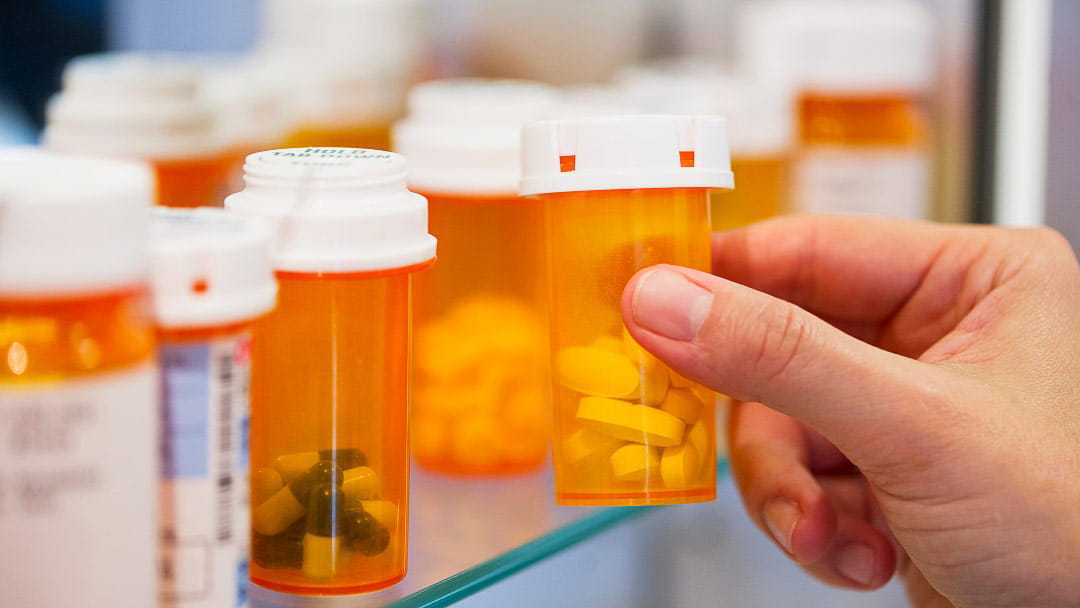 Pill bottles on shelf