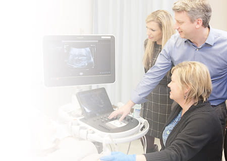 Family observes sonogram process