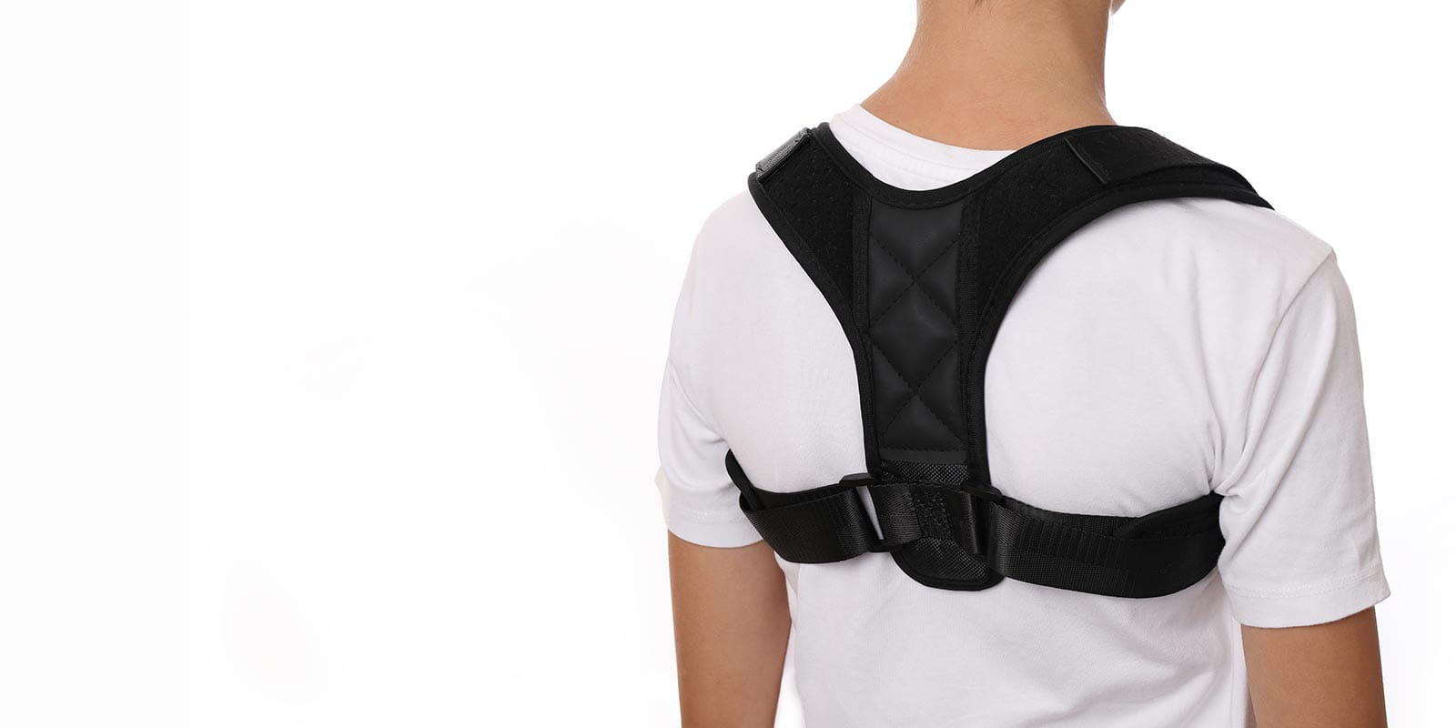 Boy wearing posture corrector