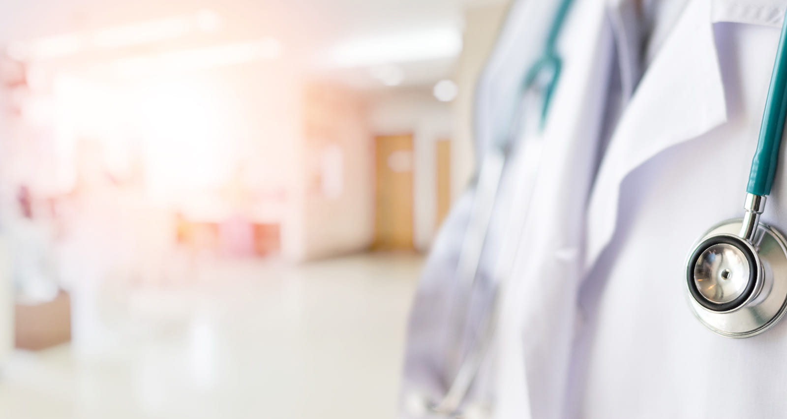 Closeup of a physician in a hospital hallway