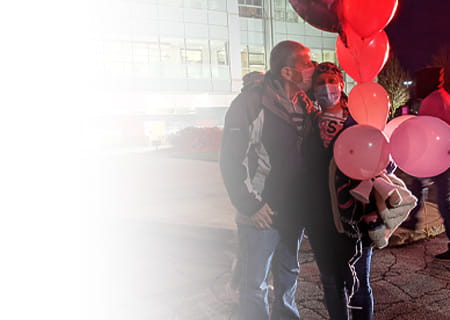 Alison celebrates outside UH Seidman Cancer Center