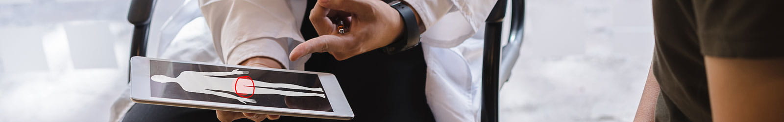 Male doctor and male patient are discussing about testicular cancer test report