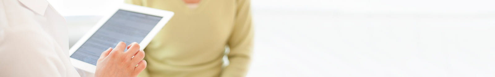 Doctor using a tablet computer