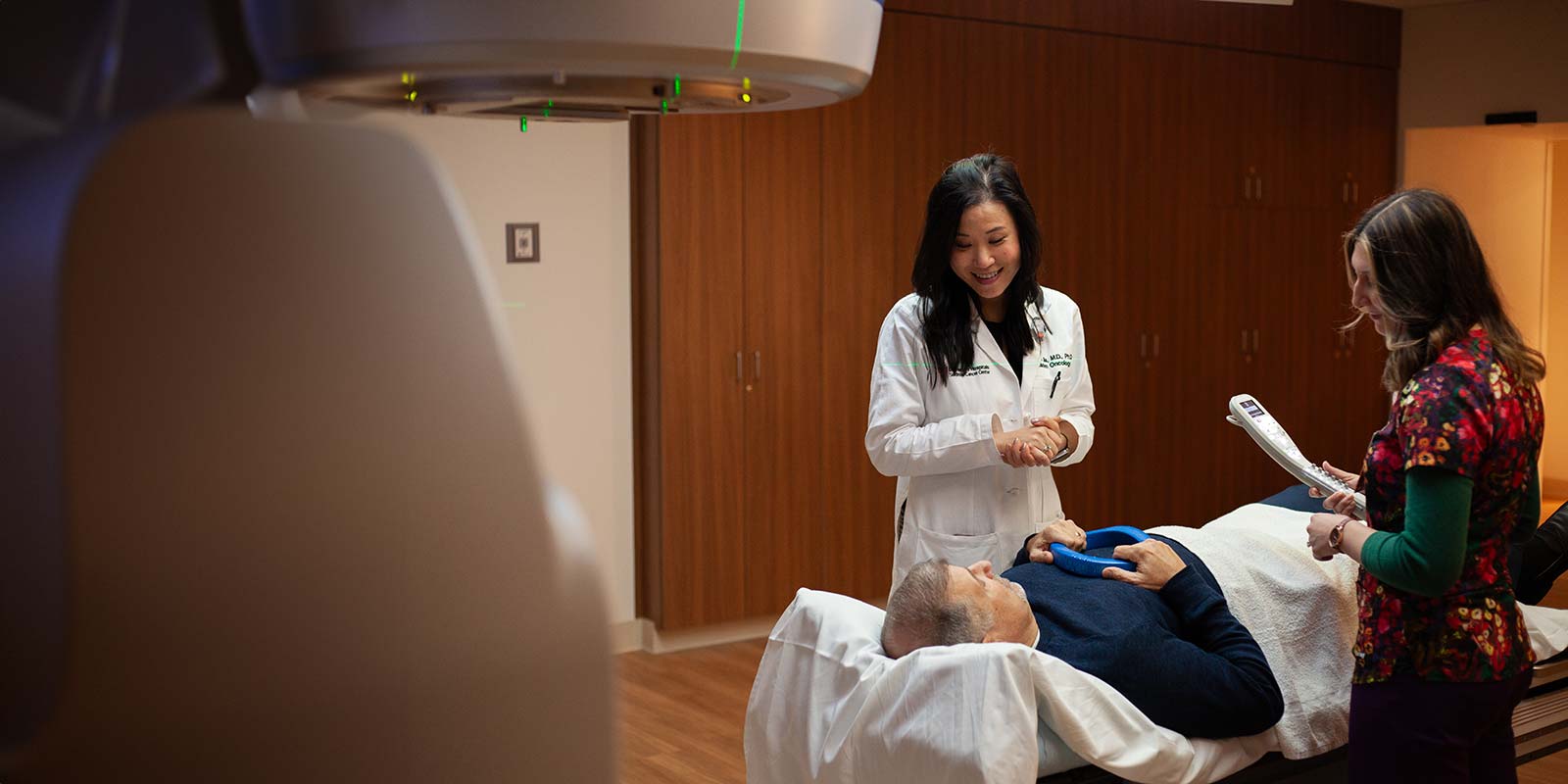 Dr. Jia with a patient at CMC Seidman