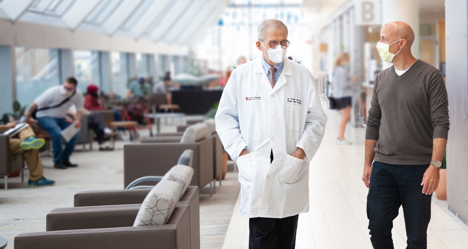 Koen van Besien, MD consults with a patient at UH Seidman Cancer Center