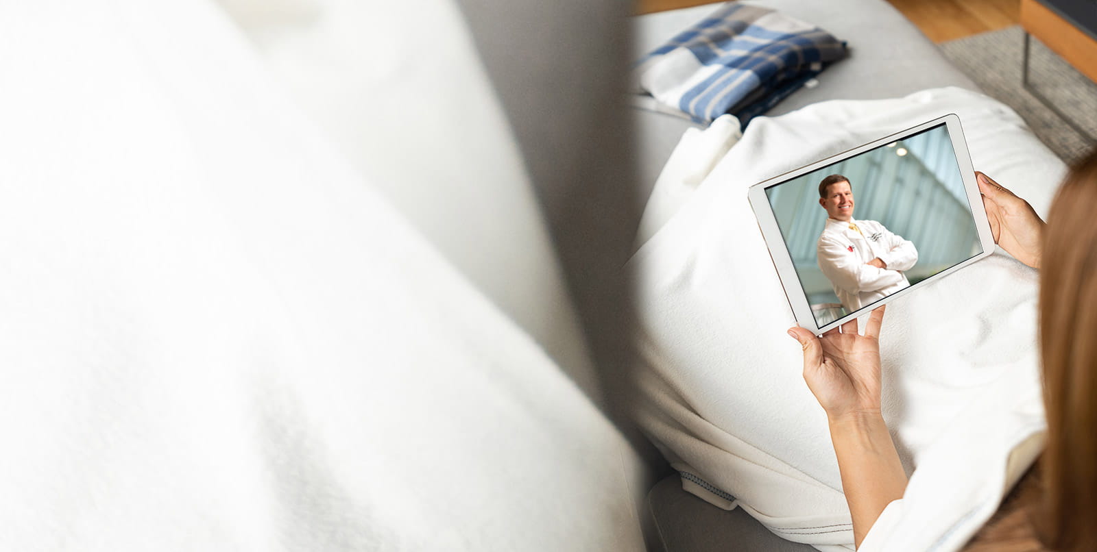 Isolated patient meeting with Dr. Hardacre via tablet