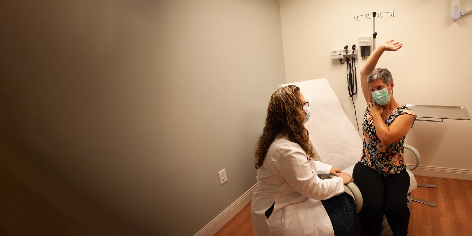 Dr. Lyons with patient for radiation oncology