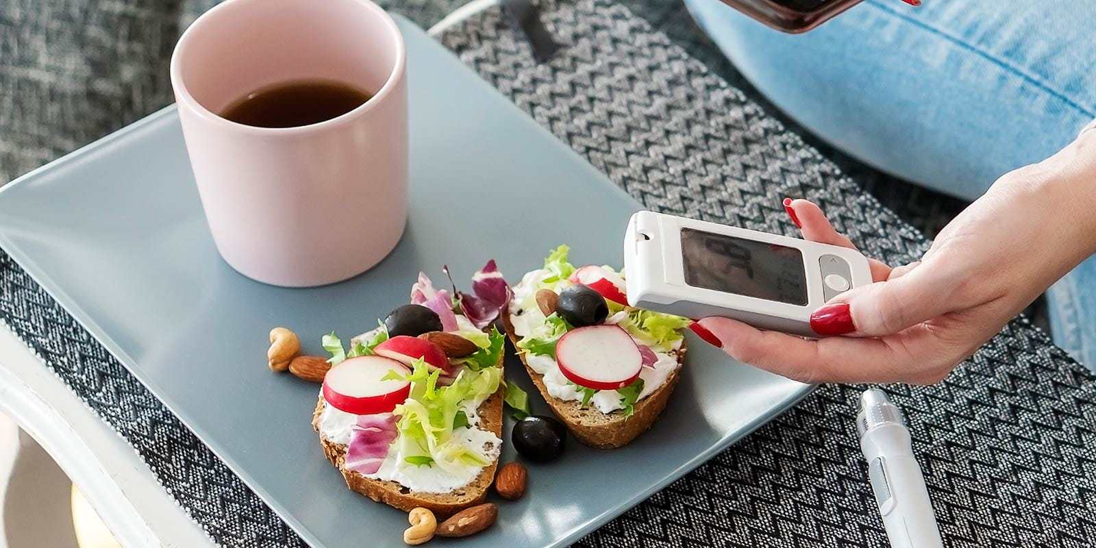 An adult diabetic woman having breakfast at home