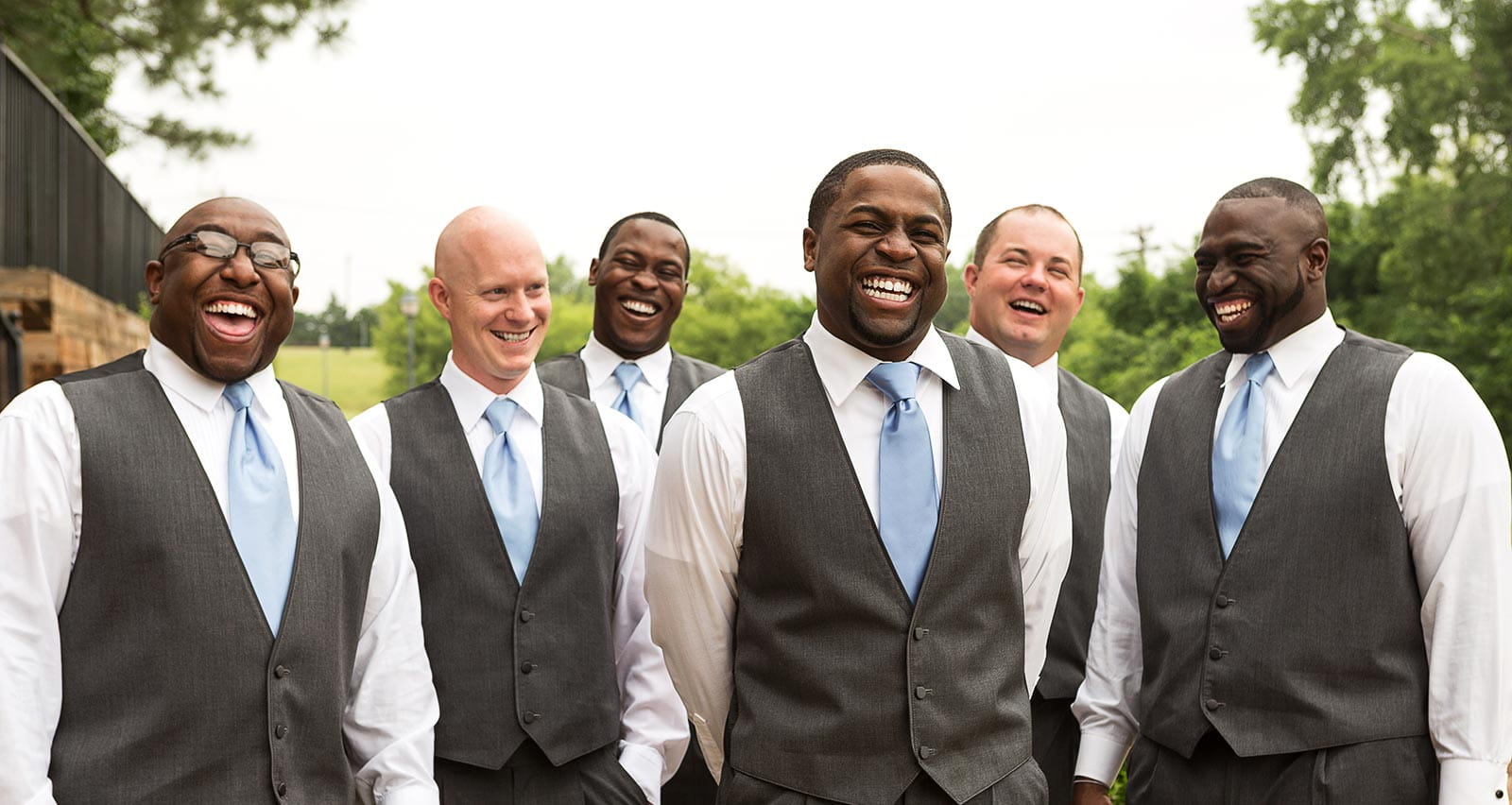 A diverse group of groomsmen