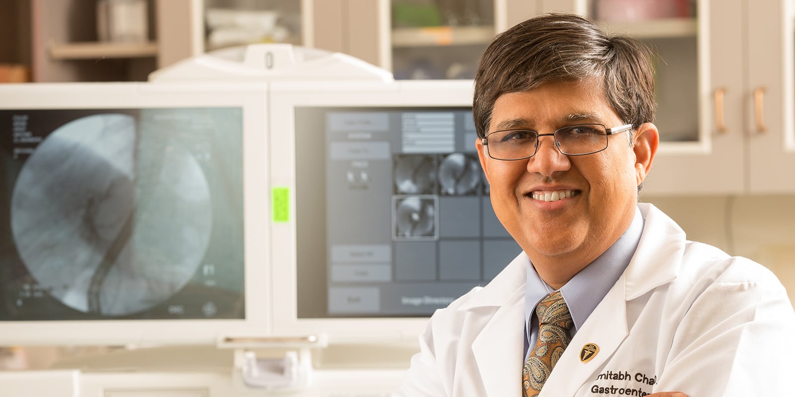 Dr. Chaz reviewing medical scans.