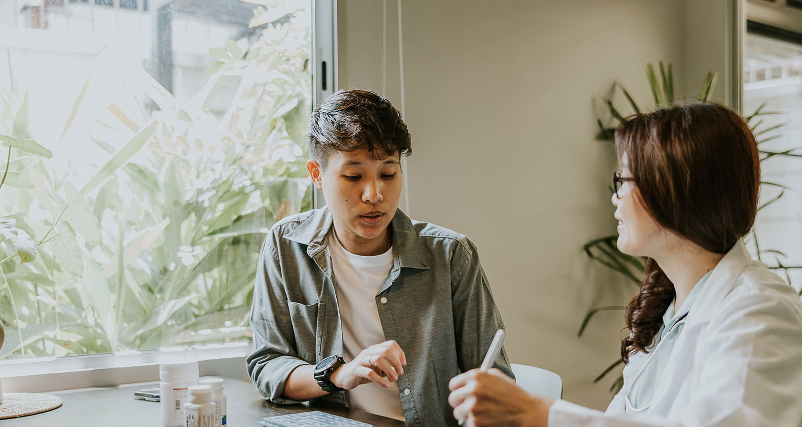 Transgender patient consults with a physician