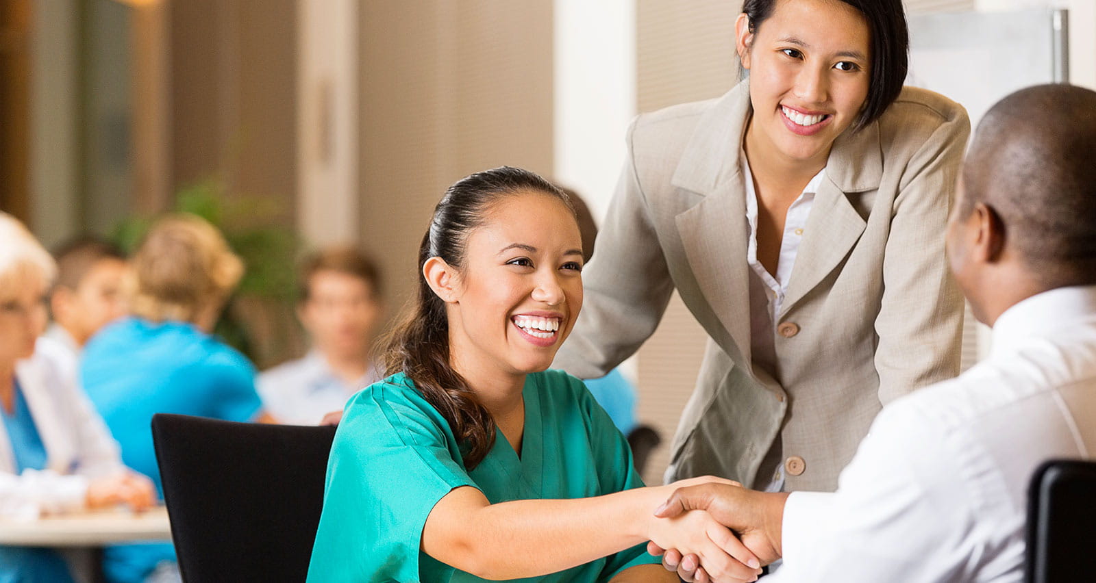 A hospital employee conducting an interview