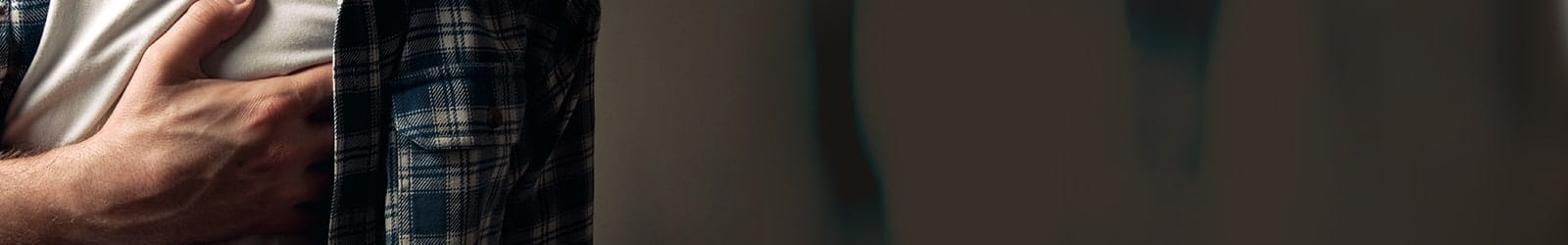 Man having a heart attack symptom.