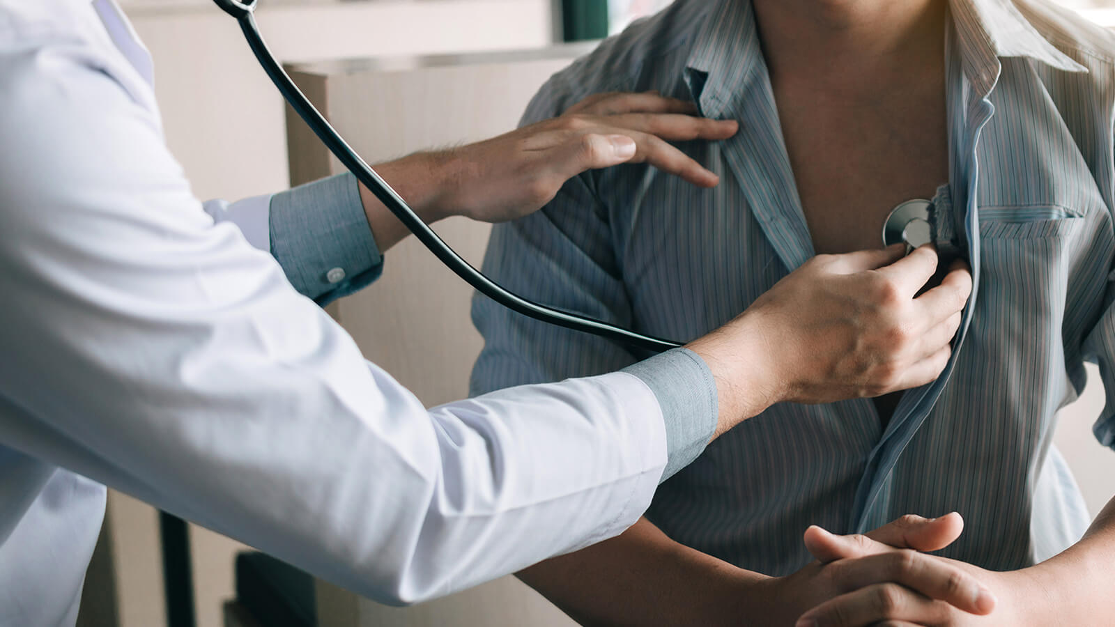 A man having his heartbeat checked