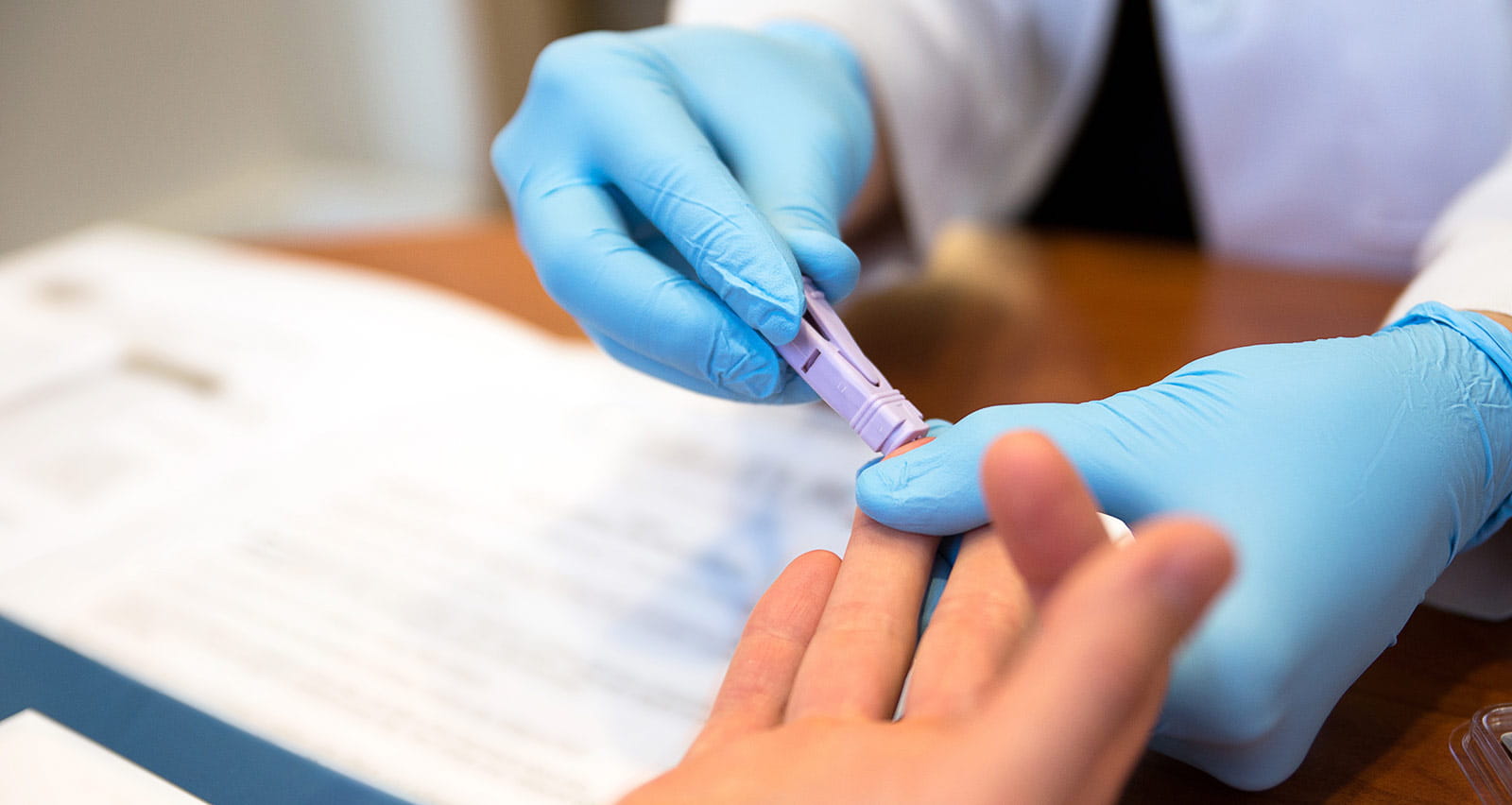Patient getting a blood test from a doctor