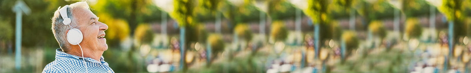 Man enjoying the outdoors listening to music.