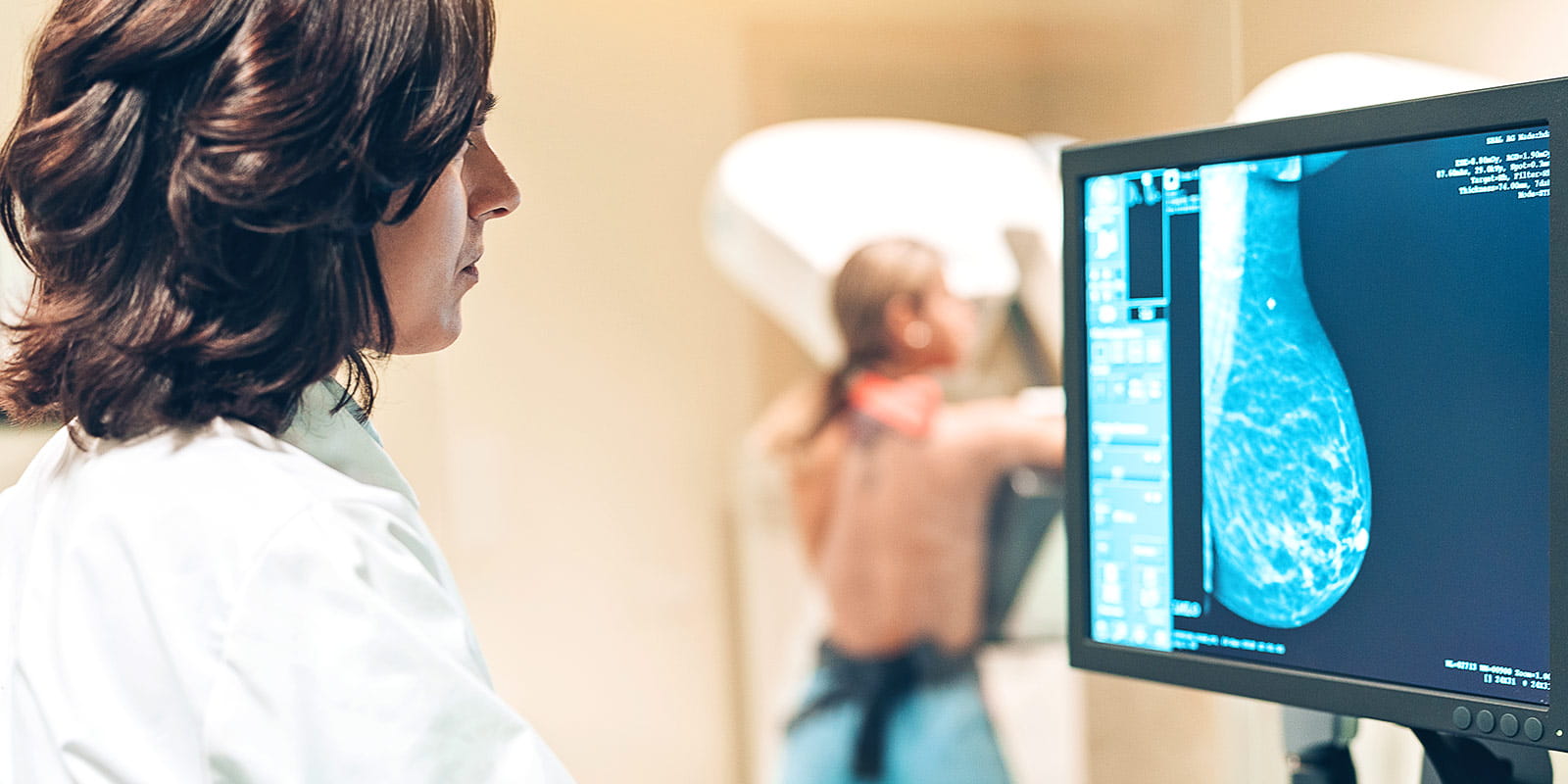 Doctor performs a digital mammography