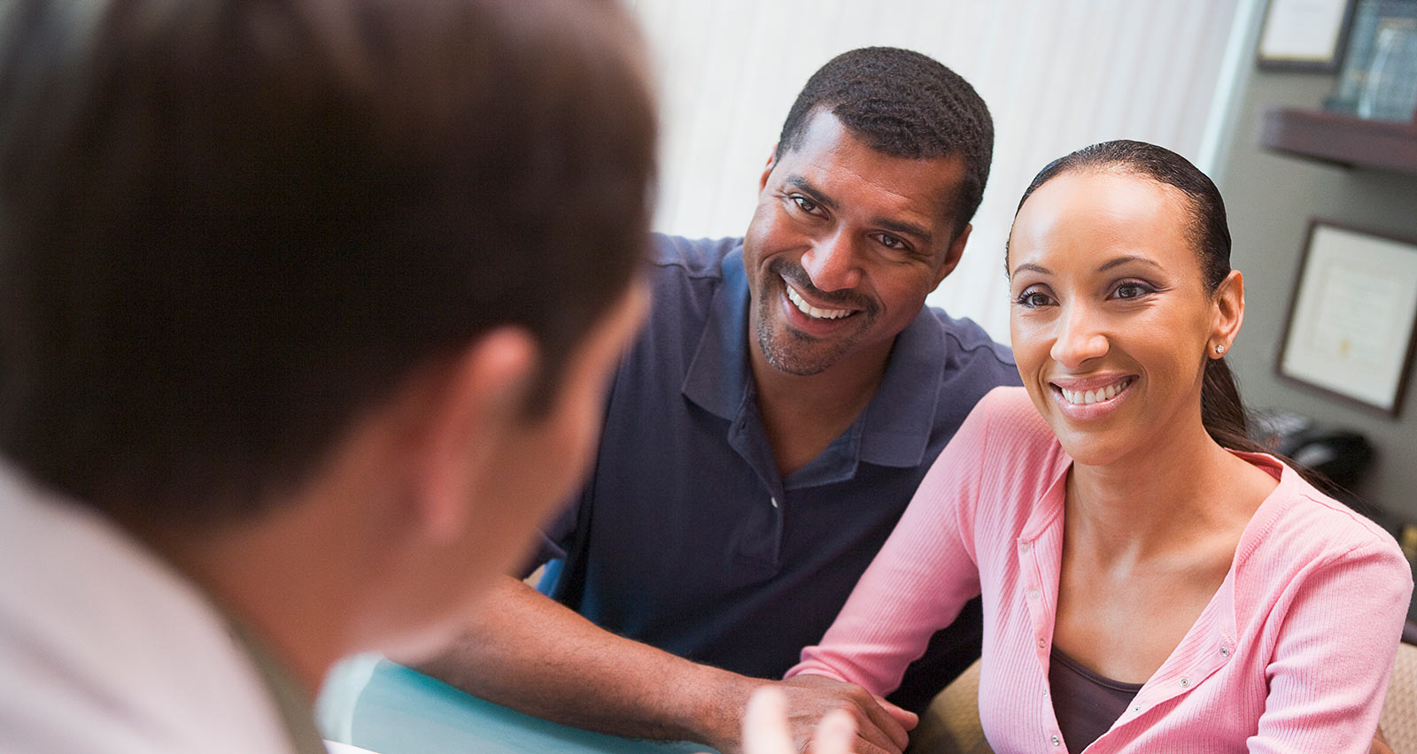 A couple in consultation at an IVF clinic
