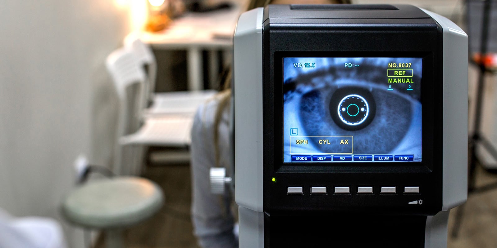 Medical Instrument analyzing patient's eye.