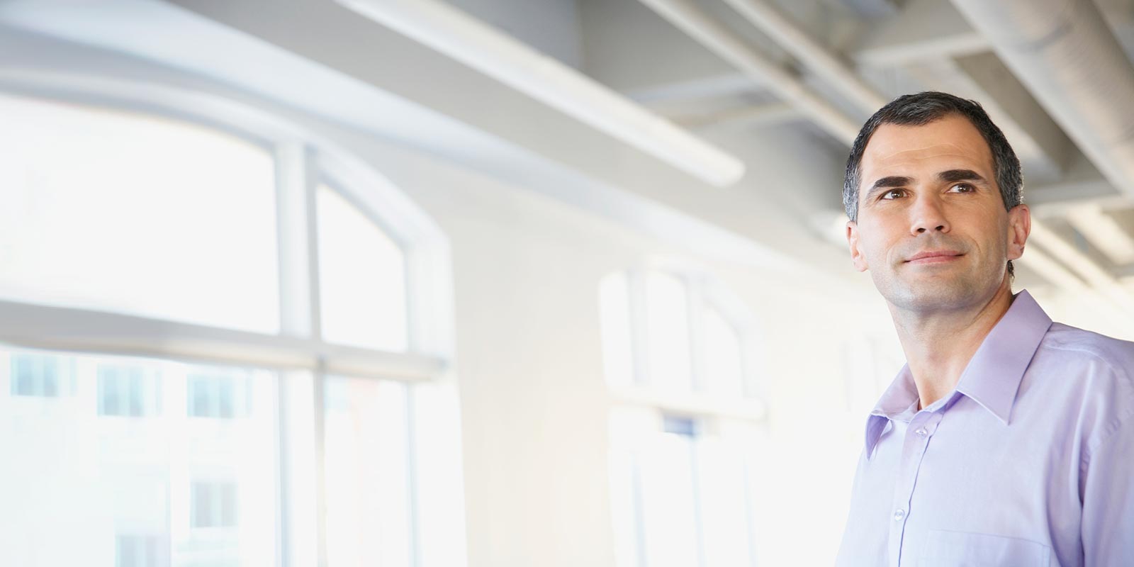 Confident Businessman with full head of hair