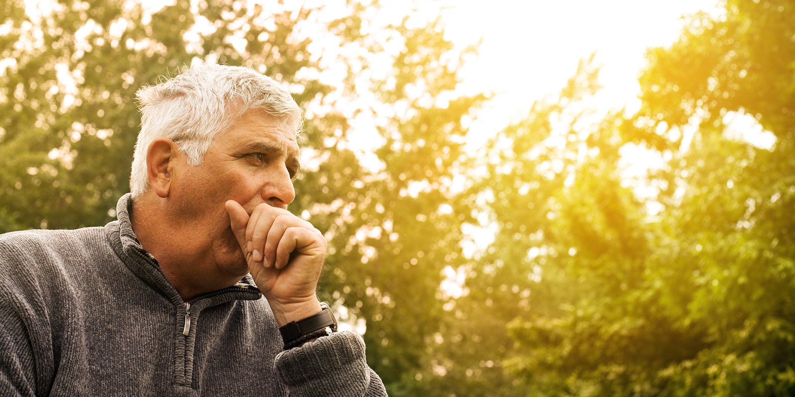 Man coughing outside.