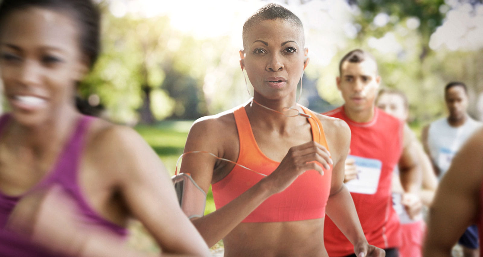 Female athlete running in race