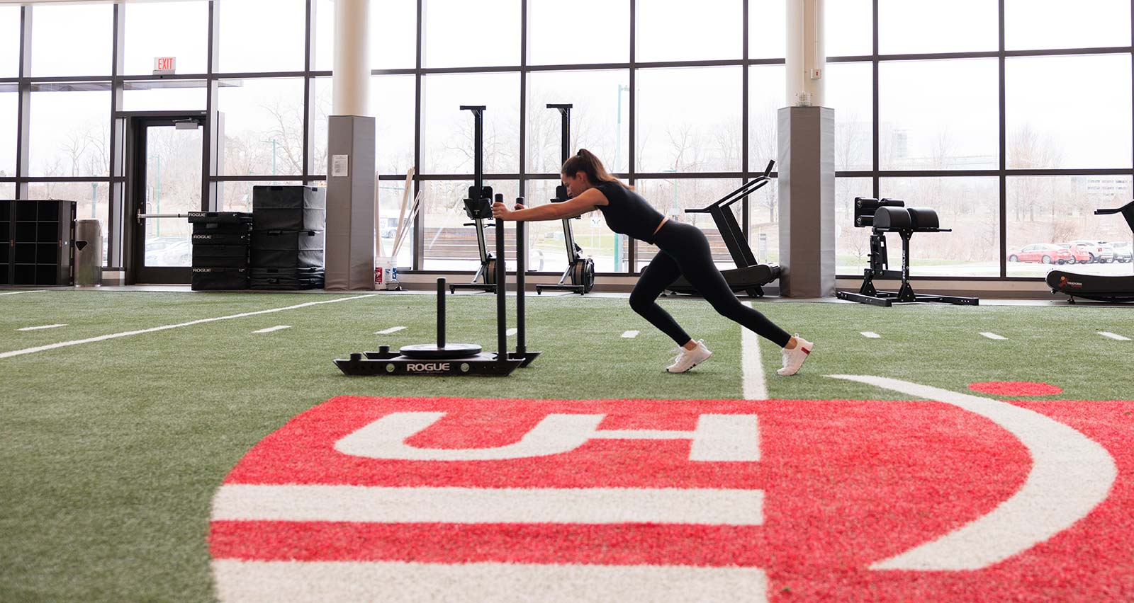 A female athlete trains on the indoor field at UH Drusinsky Sports Medicine Institute
