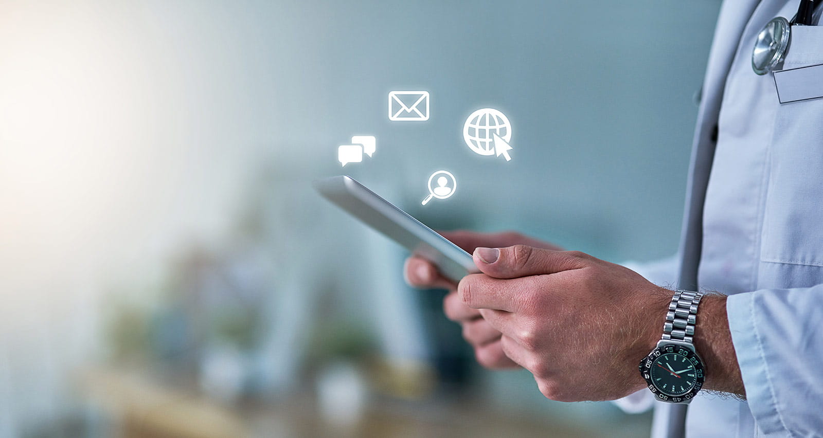 Cropped shot of a doctor receiving notifications on a digital tablet