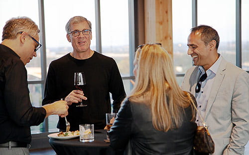 Attendees enjoy beverages at the Intersection Conference