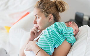 Afraid to Admit You’re Struggling After Baby? Talking About It Can Help