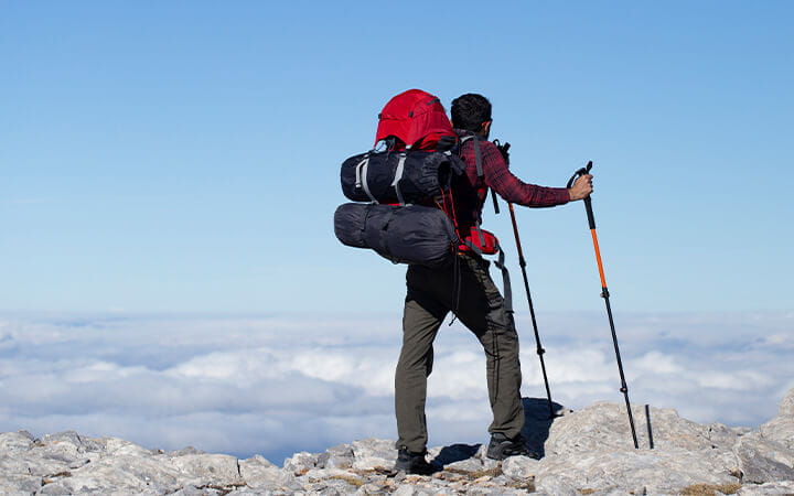 Hiker-Atop-Mountain