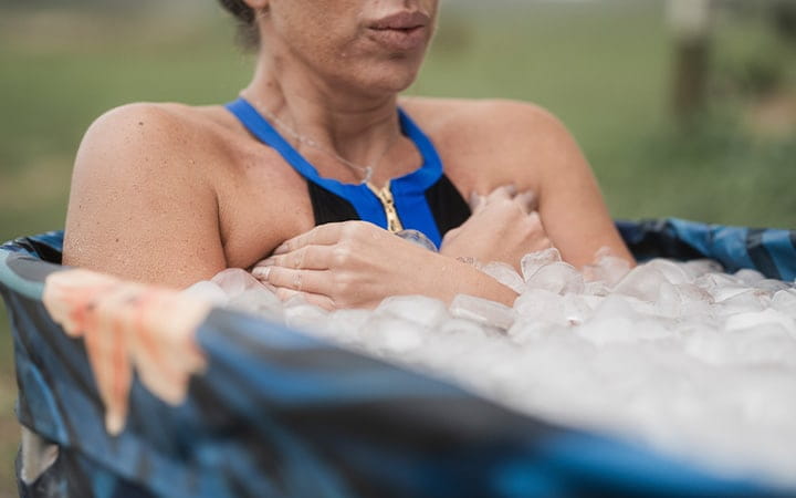 woman taking ice water bath