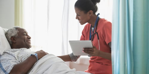 Nurse working with a patient