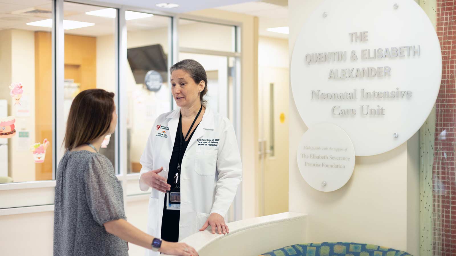 Dr. Hibbs talking with patient