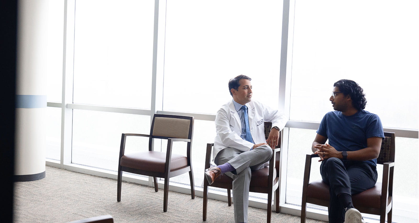 Cyrus Rabbani, MD consults with a patient at UH Minoff Health Center at Chagrin Highlands